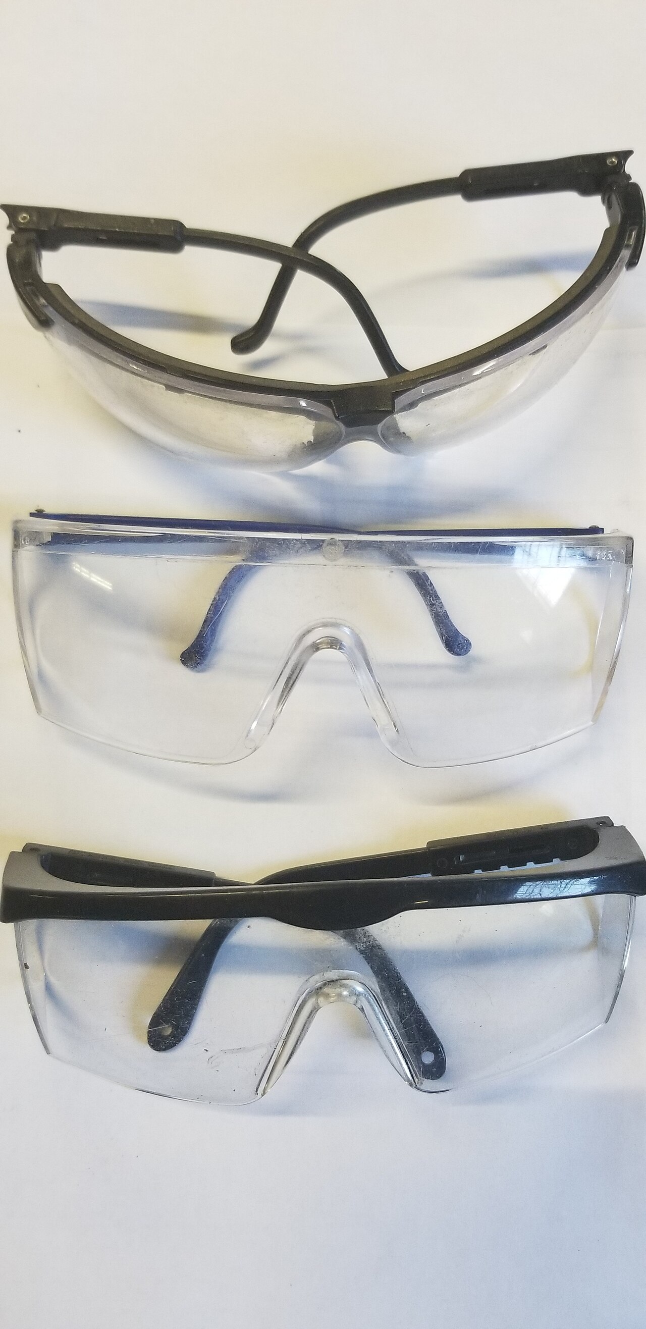 Three pairs of safety glasses