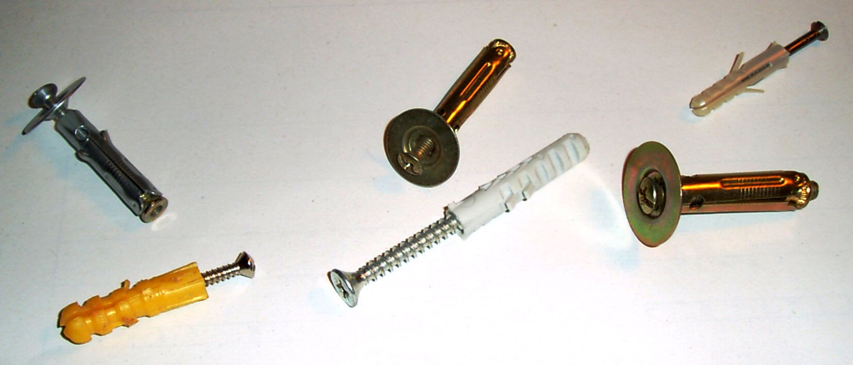 Plastic and metal wall plugs